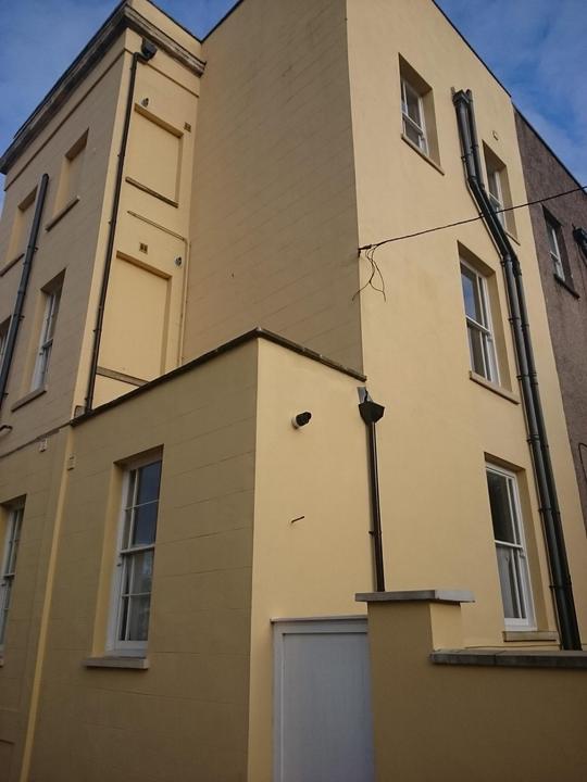 Freshly rendered townhouse elevation