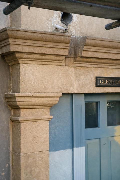 Stone door surround and pilaster